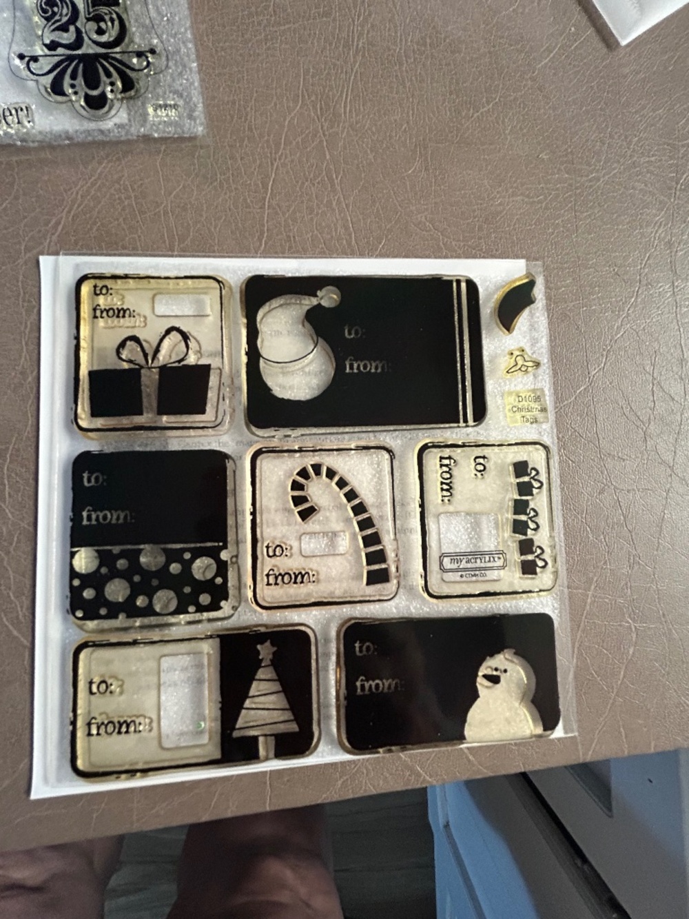 CTMH stamp sets.   2 Christmas, 2 floral blocks, 1 folders